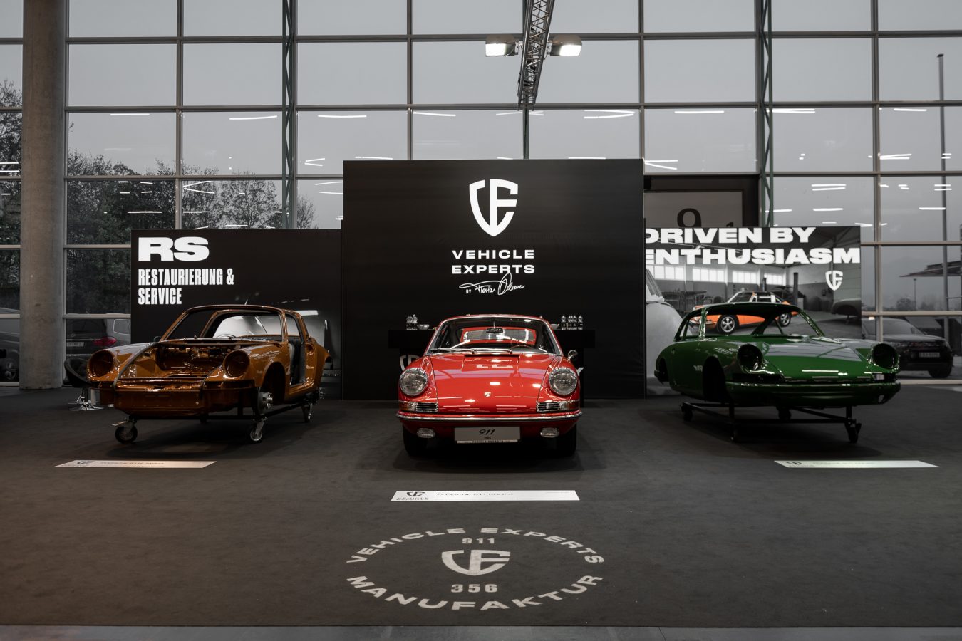 Drei Porsche 911 von vorne