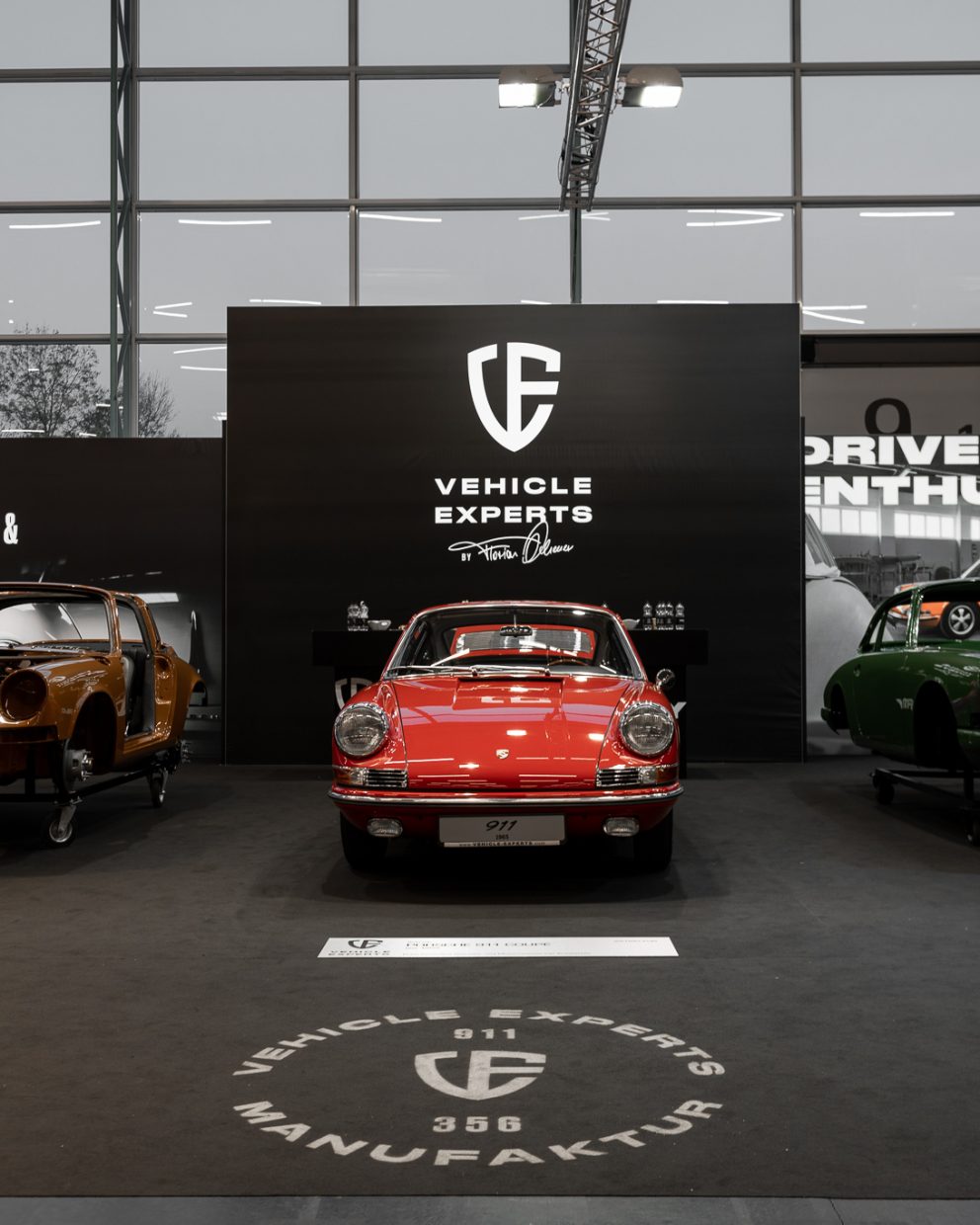 Drei Porsche 911 von vorne
